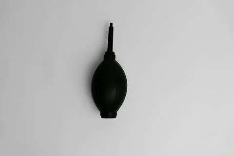 Black rubber air blower for camera cleaning isolated on white Stock Photos