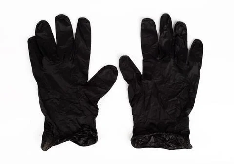 Black rubber disposable gloves, isolate Foto stock