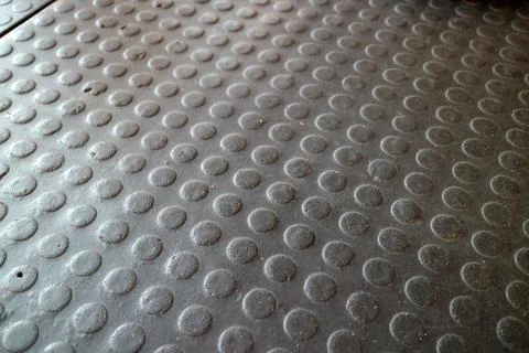 Black Rubber Floor with Circular Patterns Stock Photos