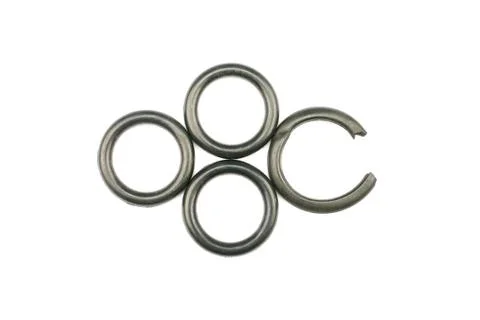 Black rubber O-ring torn and new Stock Photos