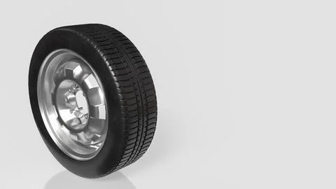 Black Rubber Tire with Shiny Silver Rim on Light Background 3d render. Stock Illustration