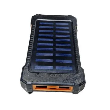 Black Rugged Portable Solar Power Bank with Orange USB Ports 스톡 사진