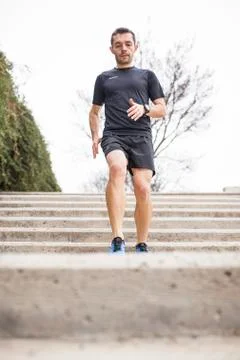 Black runner down stairs Stock Photos