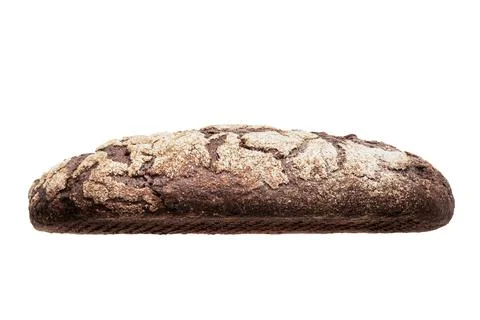 Black rustic bread sits elegantly on a white background, highlighting its Stock Photos