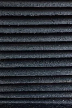 Black rusty painted blinds wallpaper Stock Photos