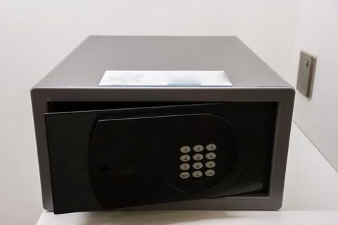 Black safe box on table Stock Photos