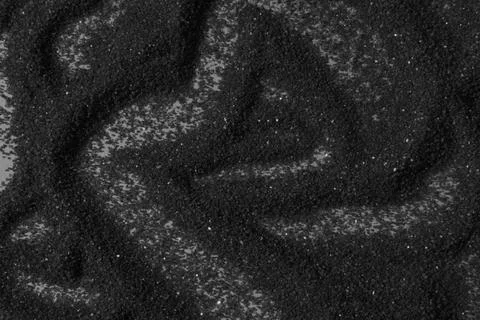 Black sand background  Stock Illustration