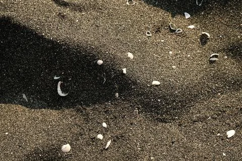 Black sand. Background. Stock-Fotos