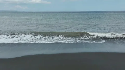 Black sand beach and rough sea waves Stock Footage 252979088