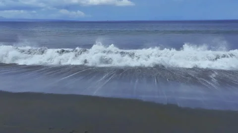 Black sand beach and rough sea waves Stock Footage 252980987
