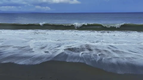 Black sand beach and rough sea waves Stock Footage 252981499