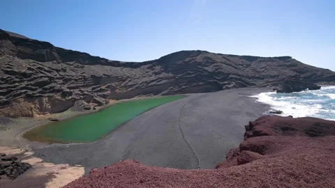 Black sand beach of Charco de Los Clicos, Charco Verde, Lanzarote. 4k Video stock 154553266