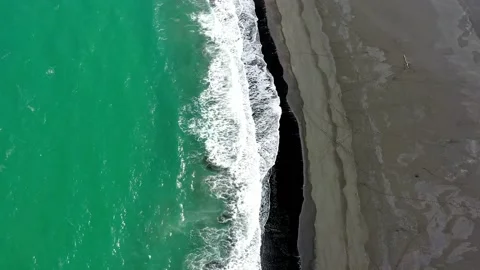 Black Sand Beach Stock Footage 169975576