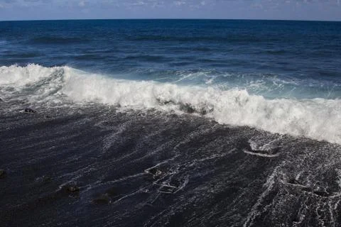 Black sand beach Stock-Fotos