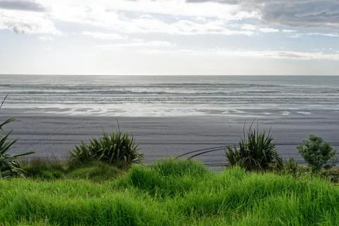 Black sand beach Stock Photos
