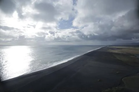 Black sand beach Stock Photos