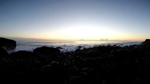 Black sand beach ,Rocks and cliffs at ocean beach. Snowy beach of Iceland. Stock Footage 118241903