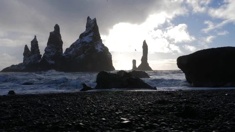 Black Sand Beach Showing Basalt Rock Formations Trolls Toes In Iceland Video stock 87247123