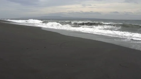 Black sand beach when it stormy weather. Stock Footage 104258922