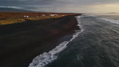 Black sand on the Pacific ocean beach Stock Footage 280363679