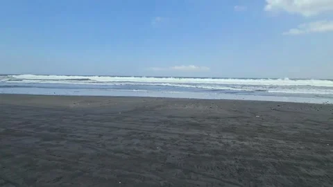 Black sand Pasut beach on tropical island, Bali, Indonesia Stock Footage 283519111