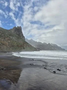 Black sanded beach Stock Photos
