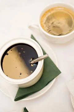 Black sauce on a white table Stock Photos