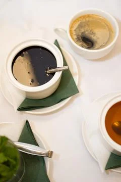 Black sauce on a white table Stock Photos