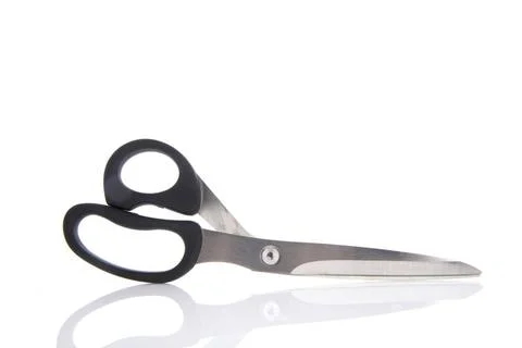 Black scissors isolated over white background Closed black scissors isolat... Stock Photos