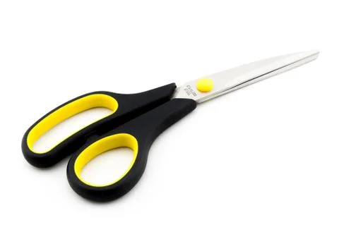 Black Scissors with yellow elements isolated on white background Stockfoto's