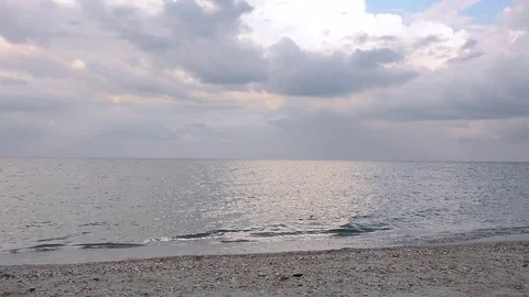 Black Sea, beach and clouds at sunset after rain Stock Footage 98605970
