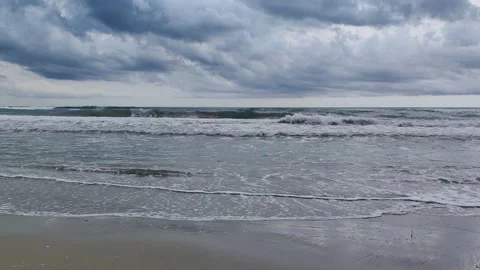 The black sea with high waves. a storm at sea. summer vacation. sandy beach Stock Footage 250974281