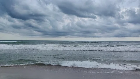 The black sea with high waves. a storm at sea. summer vacation. sandy beach Stock Footage 250974287