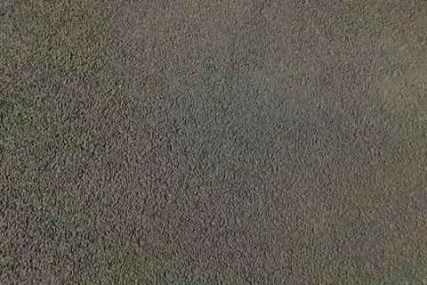 Black seamless background textured surface of asphalt road on pattern grains Stock Photos