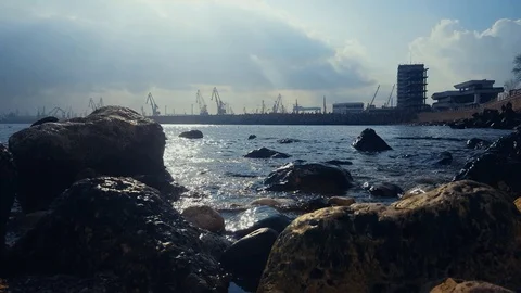The black seashore and the harbor Stock Footage 85998253