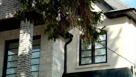 Black Second-Floor Window Frames on a Renovated White House Video stock 347155826