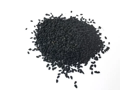 Black seed, black cumin or nigella sativa on a white background Stock Photos