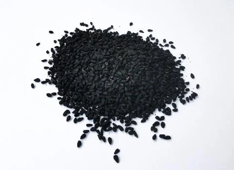 Black seed, black cumin or nigella sativa on a white background Stock Photos