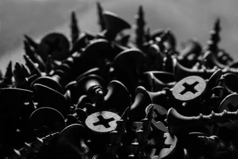 Black self-tapping screws Stock Photos