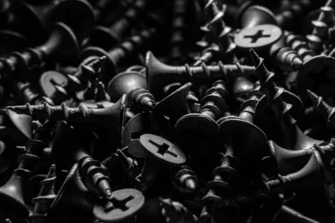 Black self-tapping screws Stock Photos