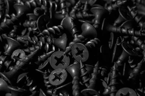 Black self-tapping screws Stock Photos