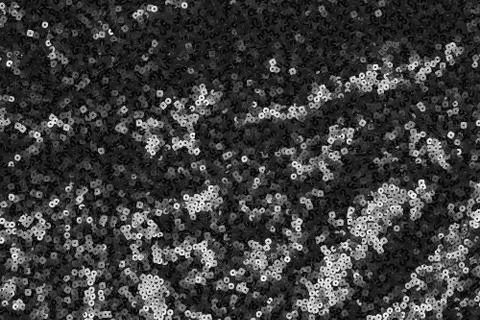 Black sequin texture background. festive background Stock Photos