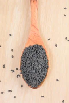 Black sesame on the spoon Foto stock