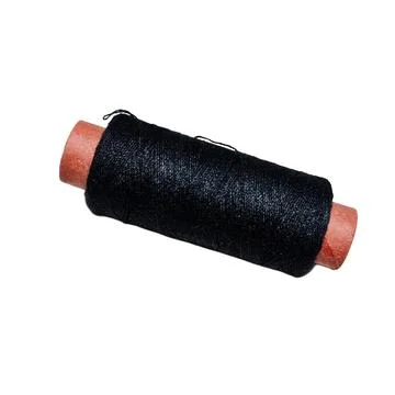 Black Sewing Thread on Brown Paper Spool 스톡 사진