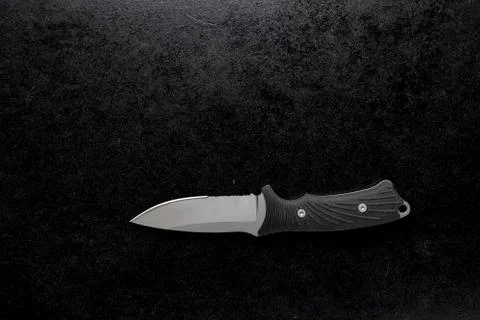 Black sharp small knife with black handle Photos