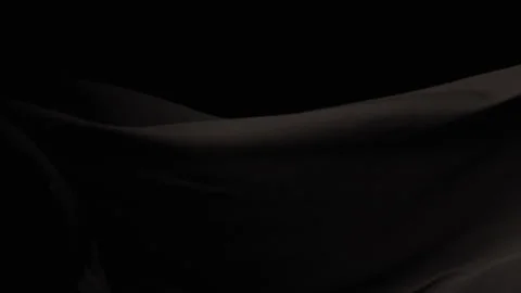 A Black Sheet Ripples and Flows Against a Black Backdrop Video stock 270398375