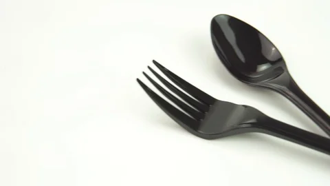 Black shine plastic fork and spoon Video stock 119914883