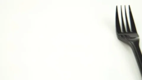 Black shine plastic fork and spoon Video stock 119914887