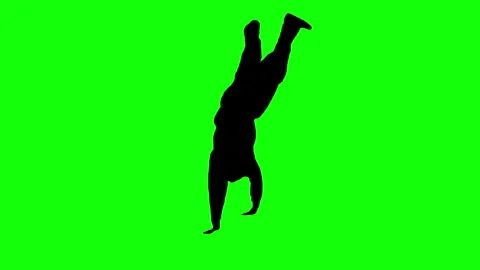 Black silhouette of B boy dancing break dance on green background. Stock Footage 339172467