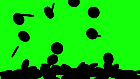 Black Silhouette coins falling down on the green background. Stock Footage 339044677